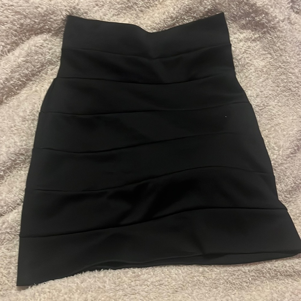 Sculpting body con black skirt